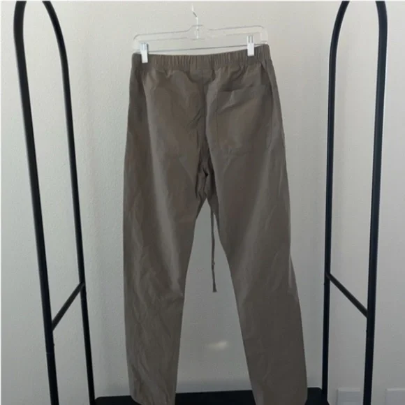 FEAR OF GOD ESSENTIALS | Nylon Cotton Satin Track Pants in Dust/Taupe | Size XS - Picture 9 of 13
